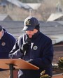 Post Service Officer, Snyder, plays the part of Pastor John P. Washington